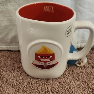Rae Dunn white mug with red interior and character decal